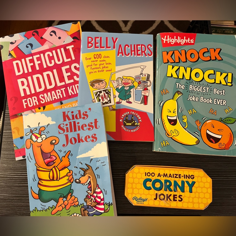 4 joke and Riddle books plus 1 corny jokes card pack (never opened)